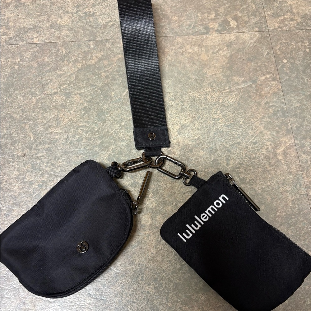 Lululemon Dual Pouch Wristlet in black.